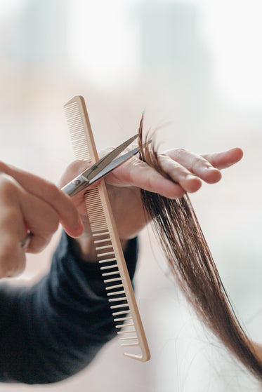 close up of cutting hair