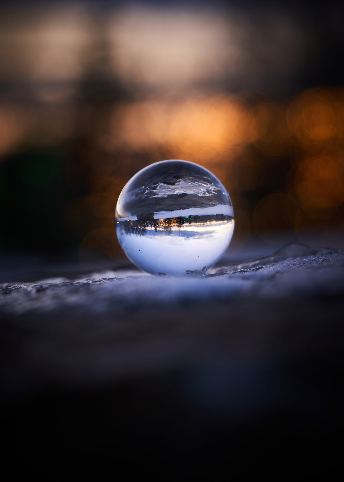 close up of glass ball in landscape