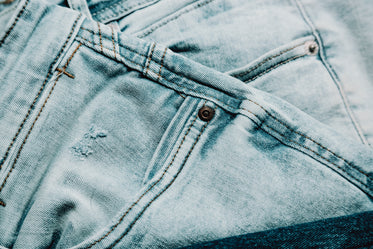 close up of lite blue jean fabric
