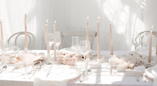 close up of pink and white wedding table setting