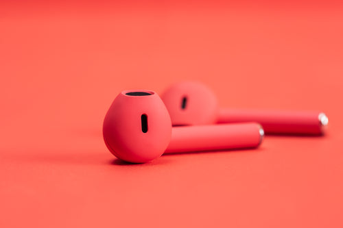 close up of red earbuds