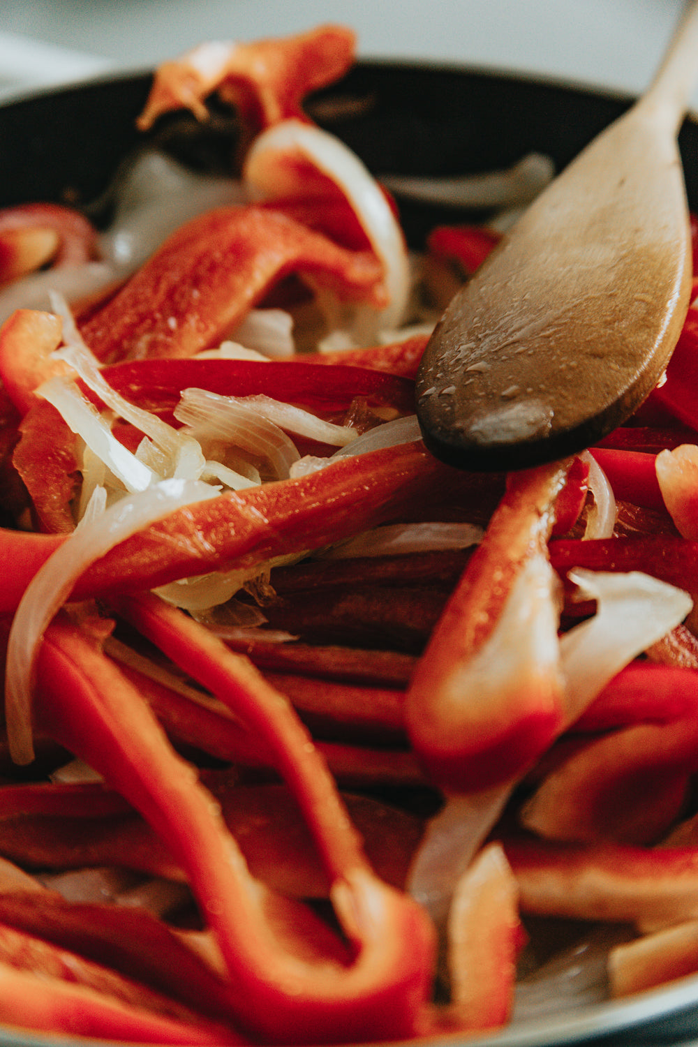 close up of red peppers and onions