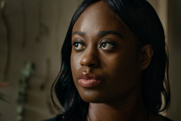 close up of woman looking away from frame