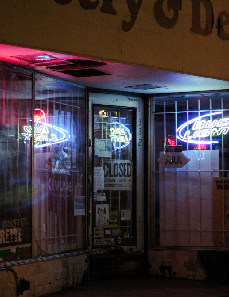 closed-store-entrance-with-a-bright-neon