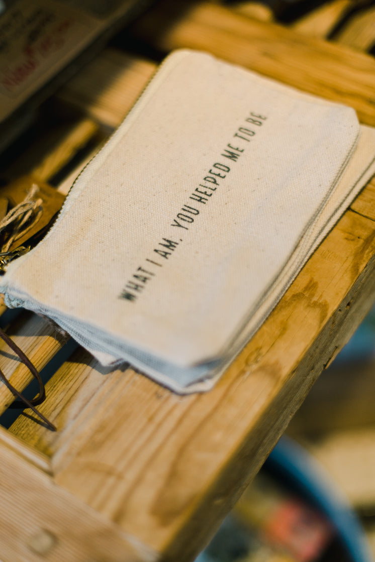 cloth-bag-with-text-on-a-wooden-shelf.jp