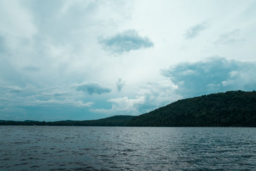 clouded sky over lake