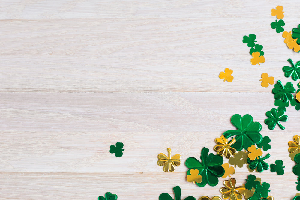 clovers on a white woodgrain texture