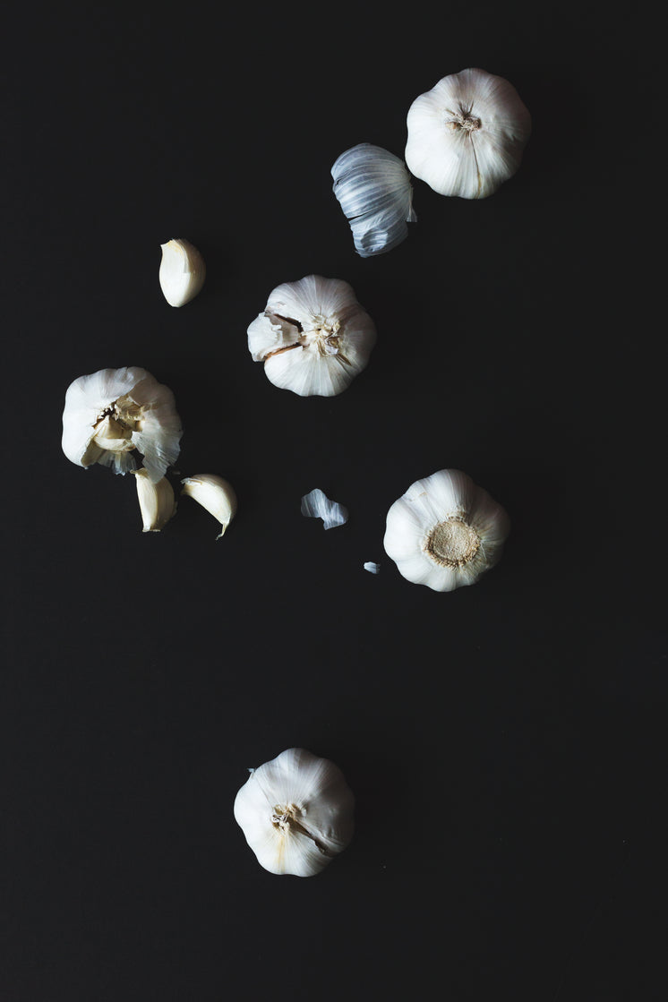 cloves-of-garlic-on-a-black-background.j