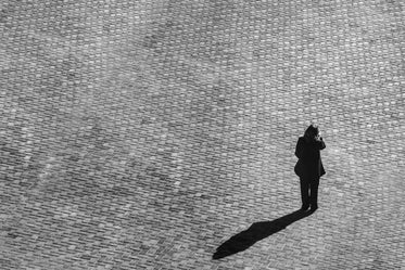 cobblestone and person with shadow