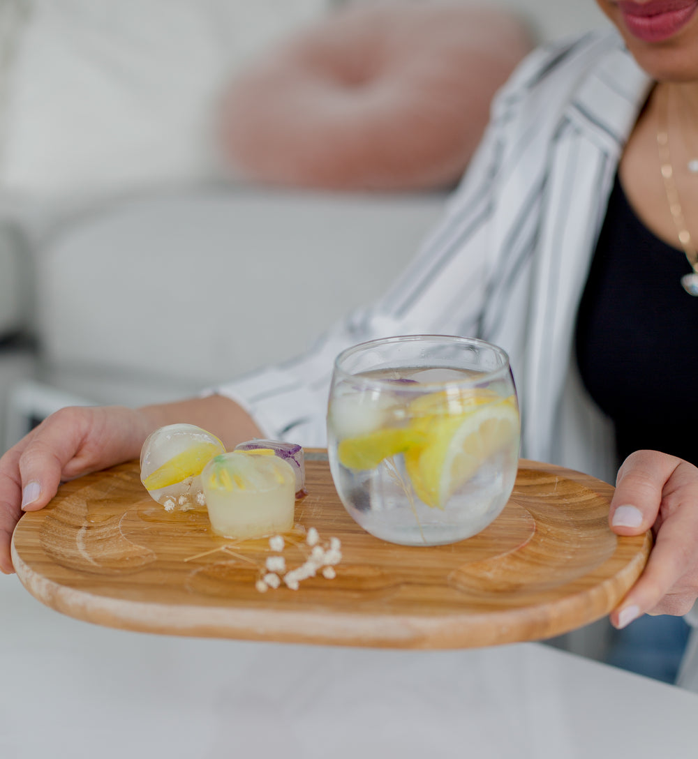 cocktail with lemon and decorated ice cubes