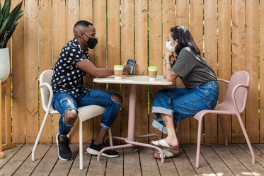 coffee on a patio with face masks