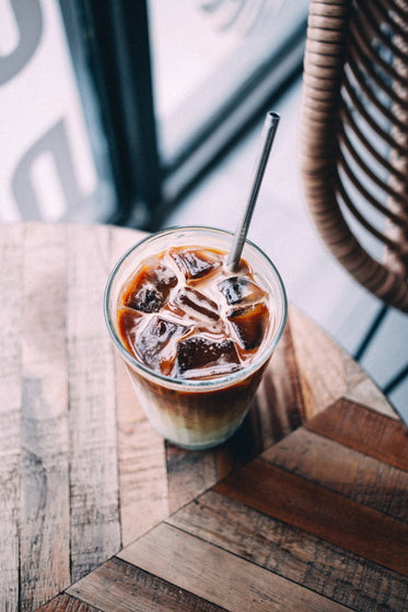 coffee shop table with iced latte