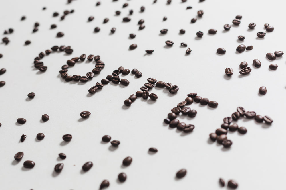 coffee written with beans