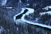 Cold Winding River In A Snow Covered Forest