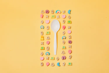 colorful cereal flat lay surrounding spoon