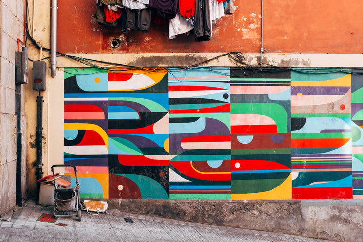 Colorful Geometric Wall Art On A Shabby Street