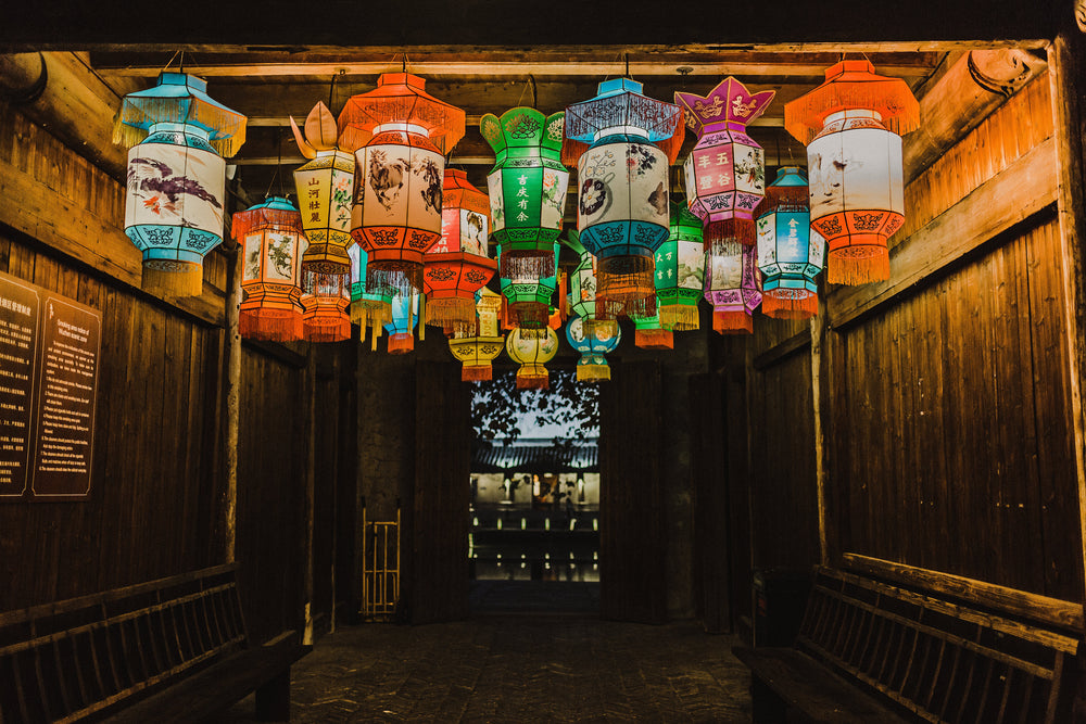 colorful lanterns hang from the ceiling