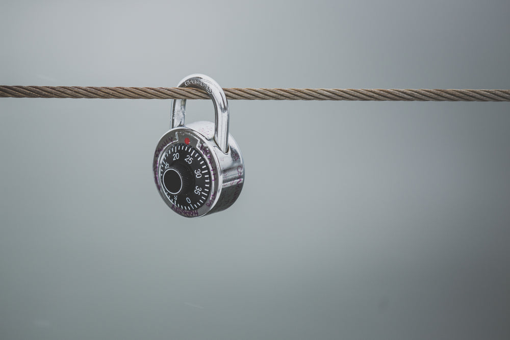 combination lock on fence