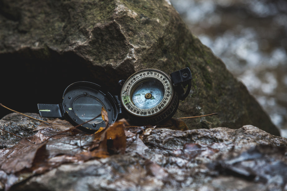 Free Stock Photo of Compass On Rocks Close-up — HD Images