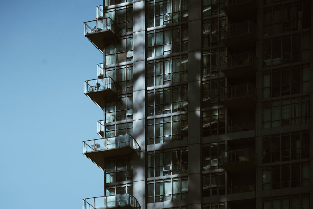 condo building balconys in shade