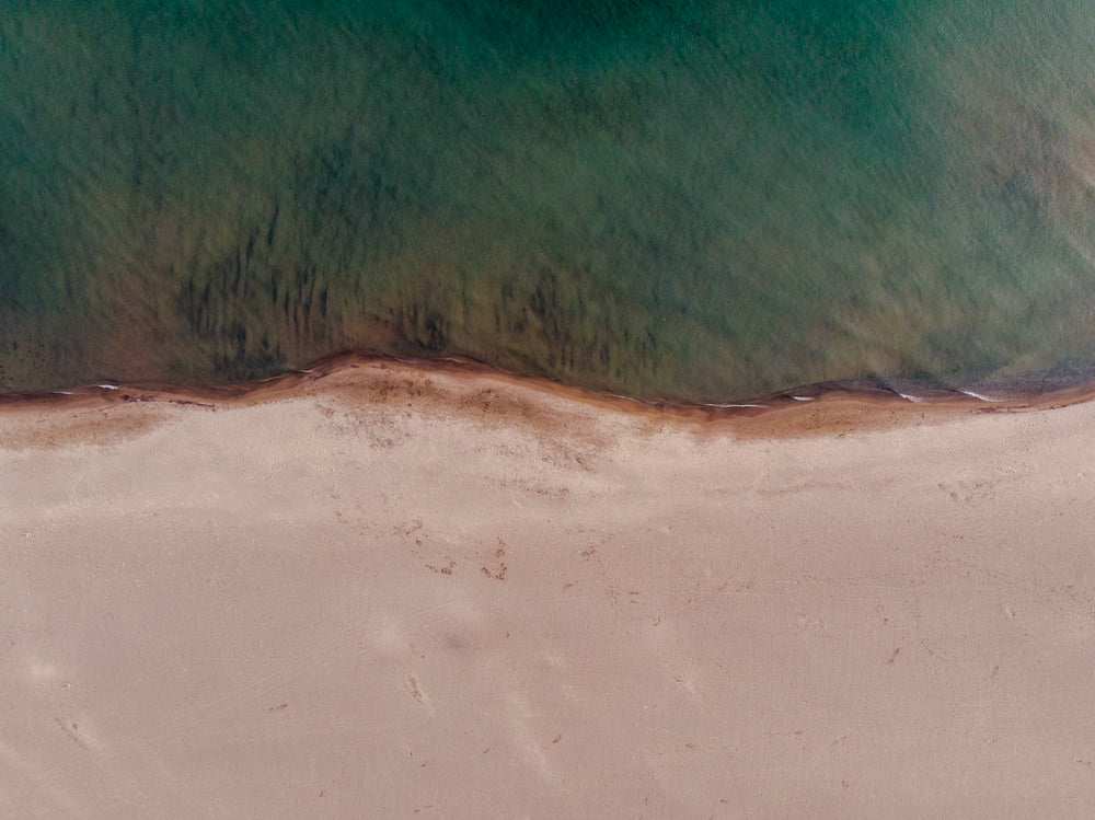 contrast between sand and sea