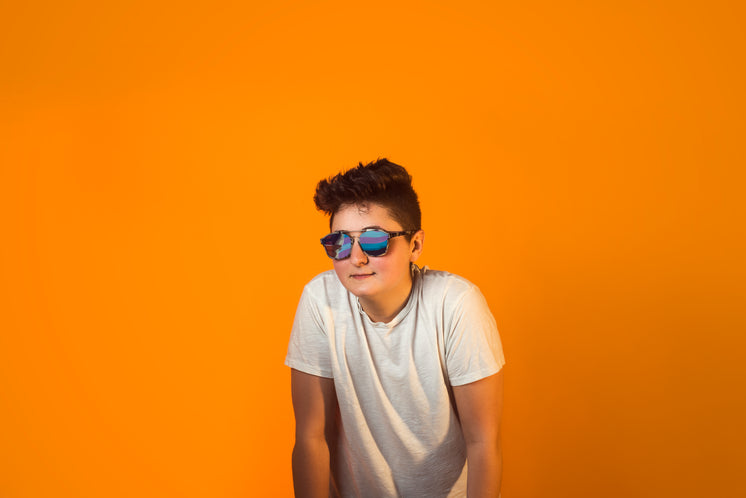 Cool Androgynous Person In Aviators And White Tshirt