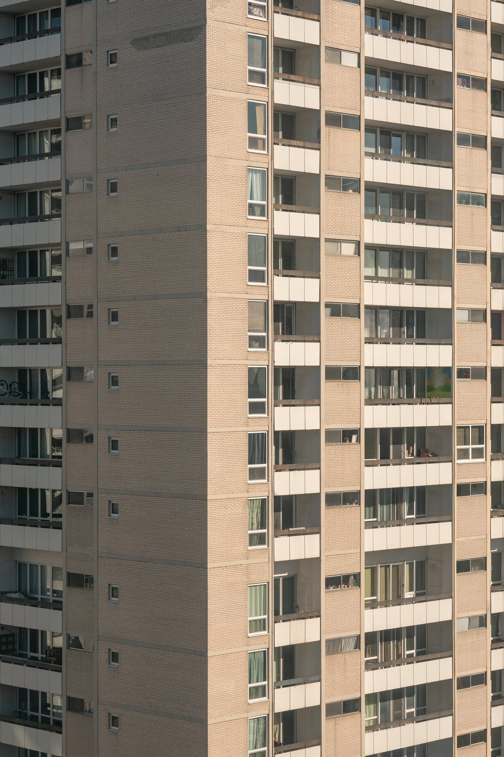 corner of a brown apartment building