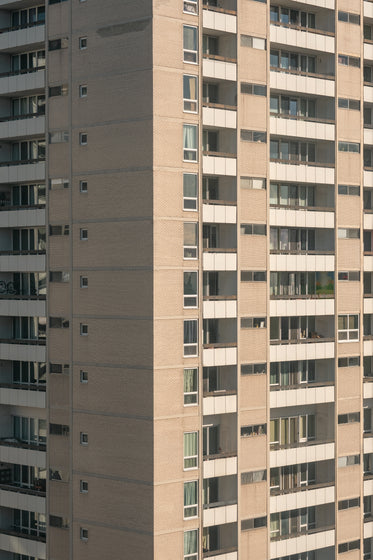 corner of a brown apartment building