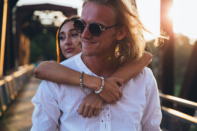 Couple In Love At Sunset