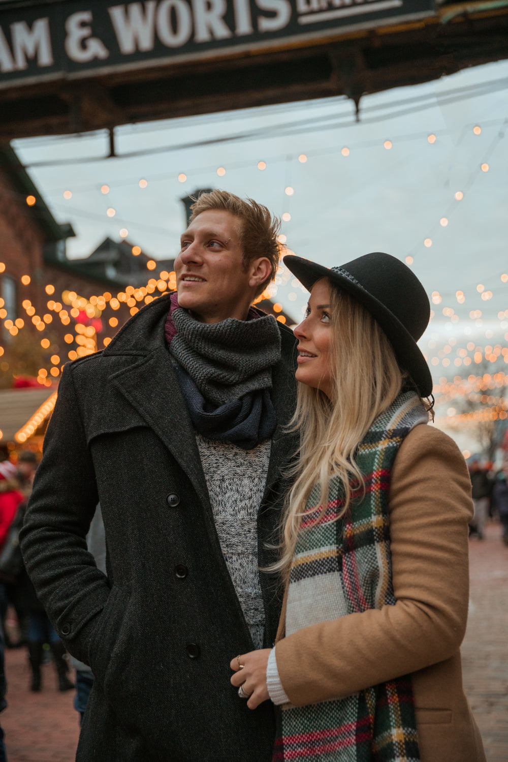 couple looking at holiday lights
