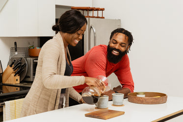 couple making pour over coffees