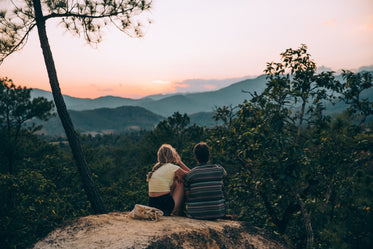 couple quietly soak in the view