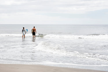 couple ready to surf