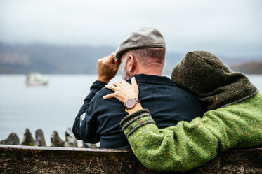 couple sits in british rain