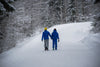 couple takes a walk in winter countryside