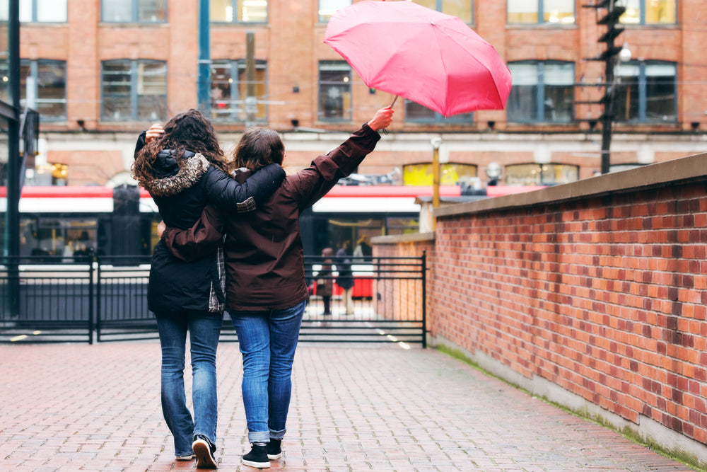 couple walking in rain