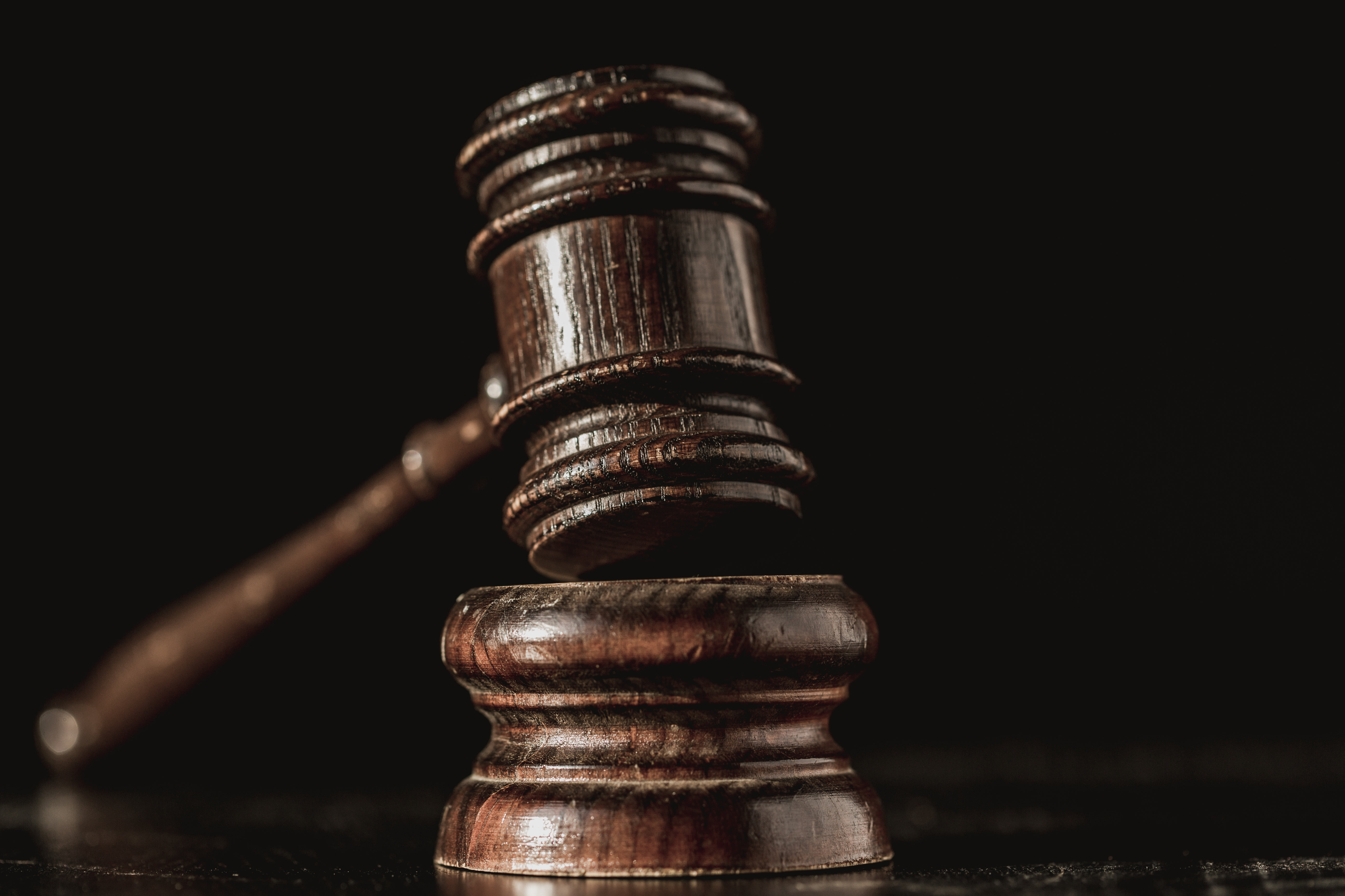 Premium Photo | Wooden gavel with law books on background law and justice  theme