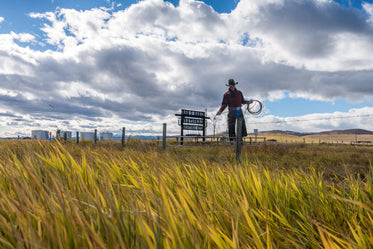cowboy ranch sign on grassy prairie