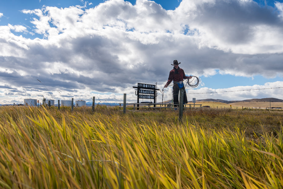 Browse Free HD Images of Cowboy Ranch Sign On Grassy Prairie
