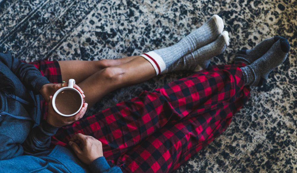 cozy couple with hot chocolate