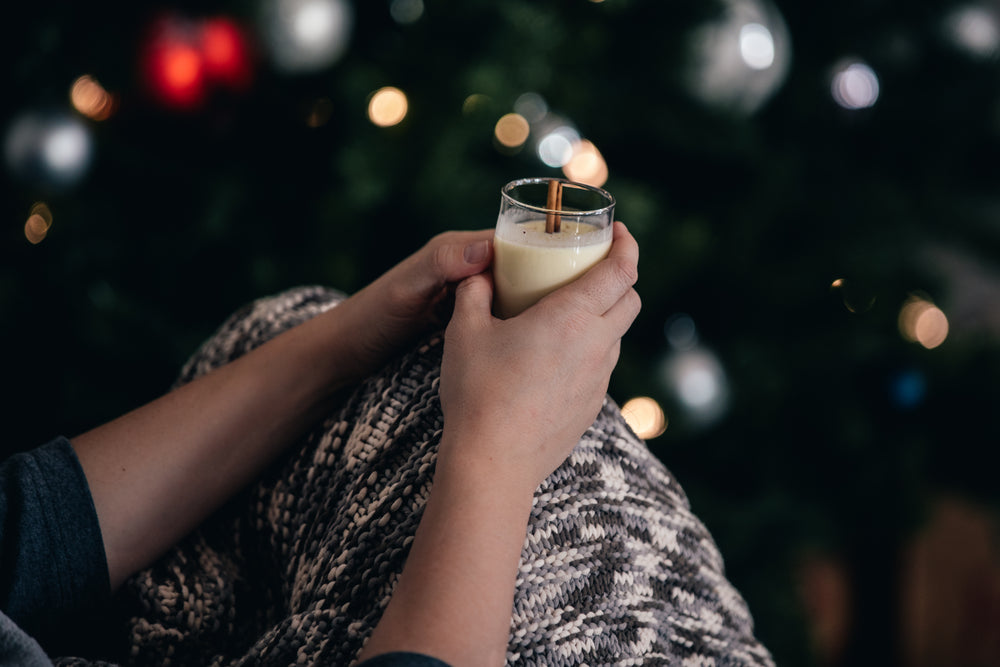 cozy eggnog by the christmas tree