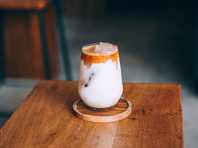 Creamy Cold Drink Sits On A Wooden Table