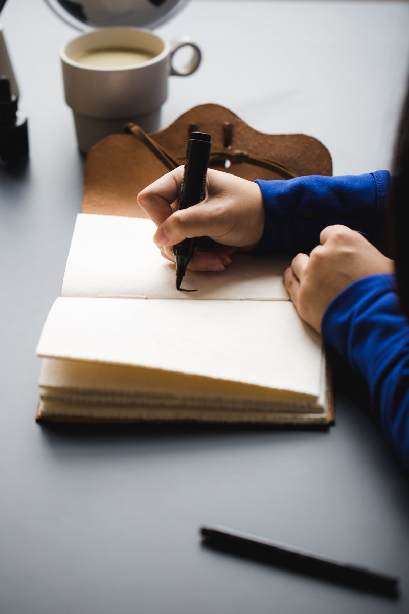 Handwriting filling the page of a journal