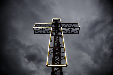 cross lit up with electric lights