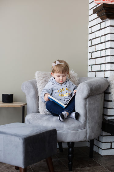 cuddled up in a big chair with a good book