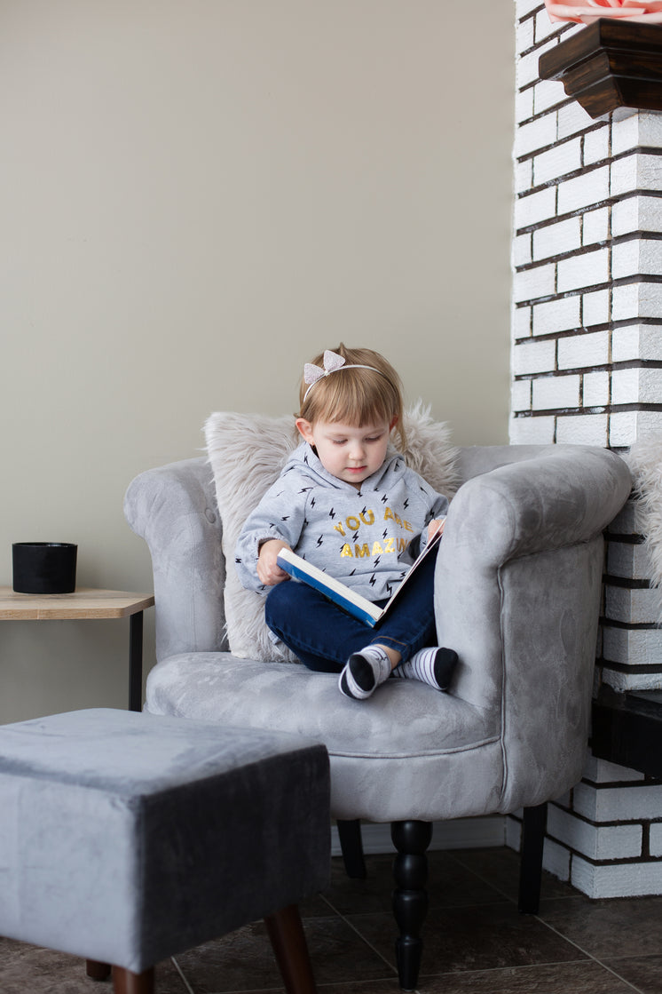 Cuddled Up In A Big Chair With A Good Book