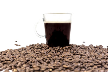 Picture of Cup Of Coffee With Beans - Free Stock Photo