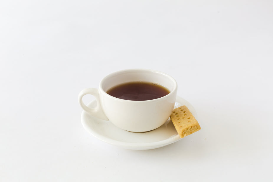 https://burst.shopifycdn.com/photos/cup-of-tea-cookie.jpg?width=925&exif=0&iptc=0