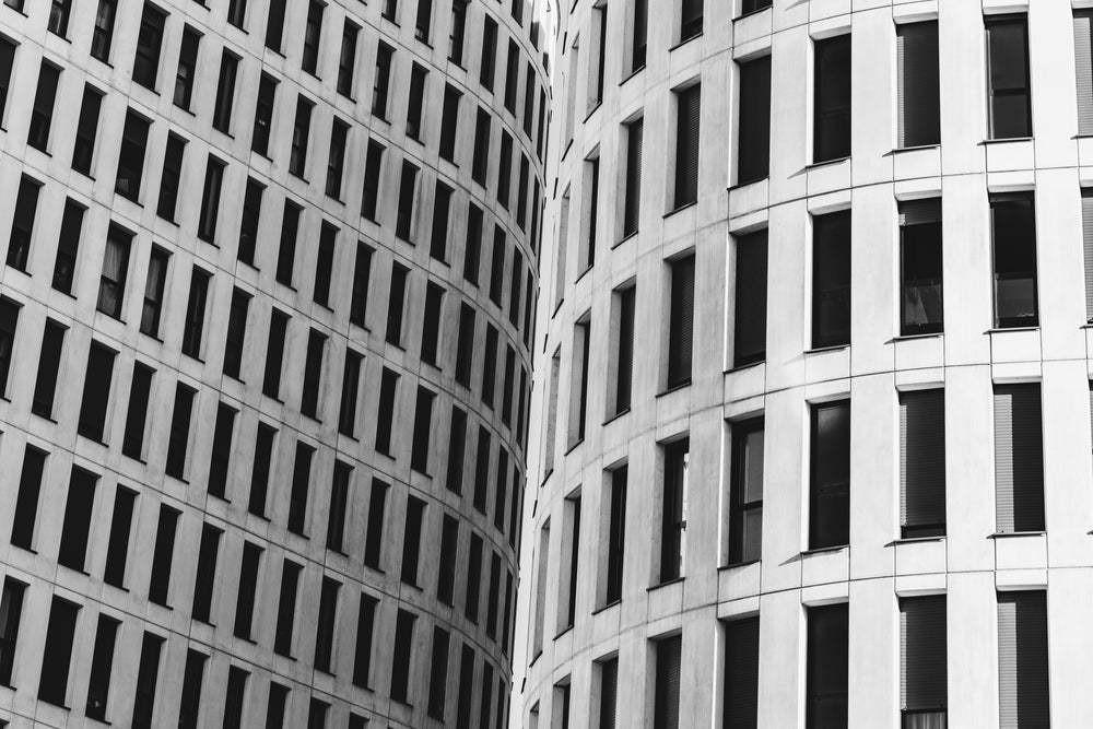 curved buildings meeting in the middle