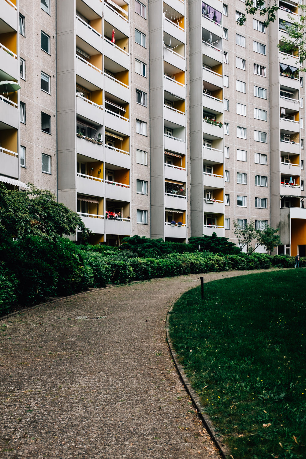 curved pathway outside apartment building